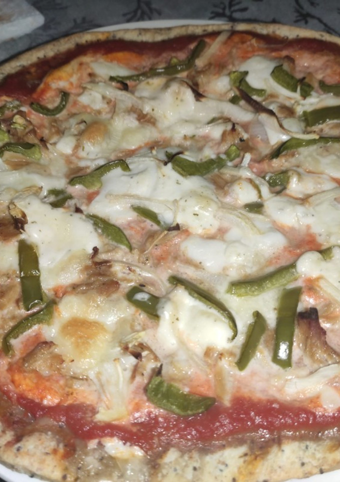 Una foto de Pizza de pollo ranchera