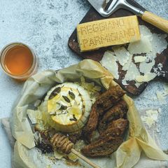 A picture of Baked Ricotta with Fresh Herbs, Honey and Parmigiano Reggiano PDO.