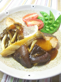 A picture of Salmon Meunière with Mushroom and Lemon Soy Sauce Dressing.