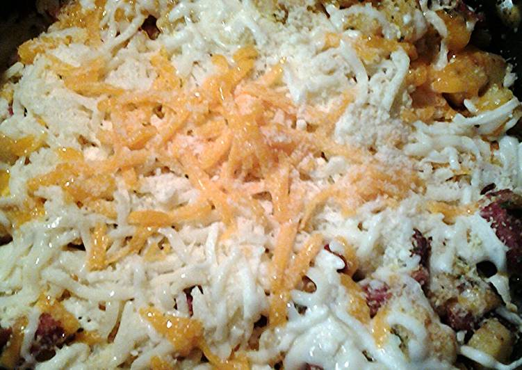 Cheesy potatoes with sausage and bacon