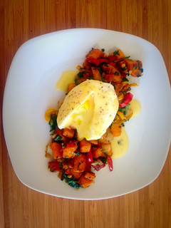 A picture of Poached Egg with Hollandaise Sauce and Sweet Potato Spinach Hash.