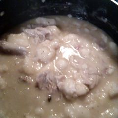 A picture of chicken and dumplings.