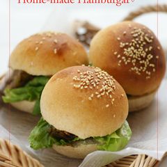Homemade Hamburgers With Handmade Buns A picture of Homemade Hamburgers With Handmade Buns.