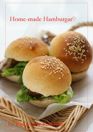 A picture of Homemade Hamburgers With Handmade Buns.