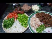 Una foto de carnitas de cerdo