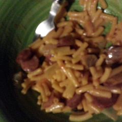 Mac & Cheese with fried onions and smocked sausage A picture of Mac & Cheese with fried onions and smocked sausage.
