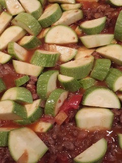 A picture of Zucchini stew with minced meat.