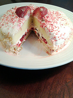A picture of Vanilla Chiffon Cake with Whipped Cream and Strawberries.