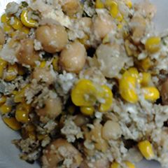 A picture of Corn egg parmesaen cheese with chick peas.