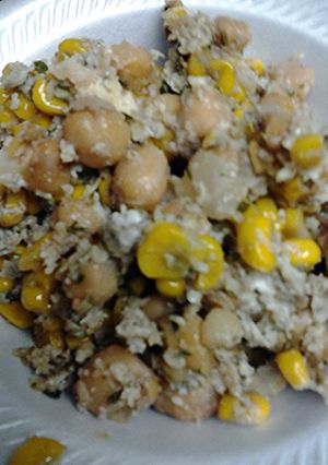 A picture of Corn egg parmesaen cheese with chick peas.