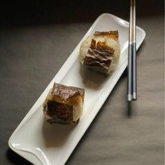A picture of Onigiri - Japanese savoury rice dish.