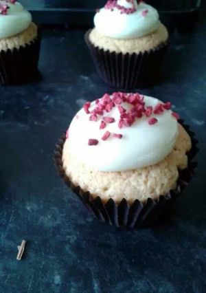 A picture of rose and raspberry cream cheese cupcakes.