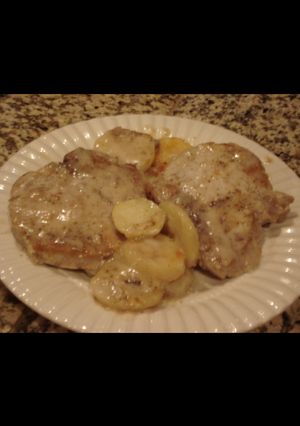 A picture of Porck chops and scalloped potatoes.