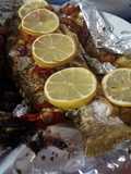 Baked red snapper with lemon and tomato