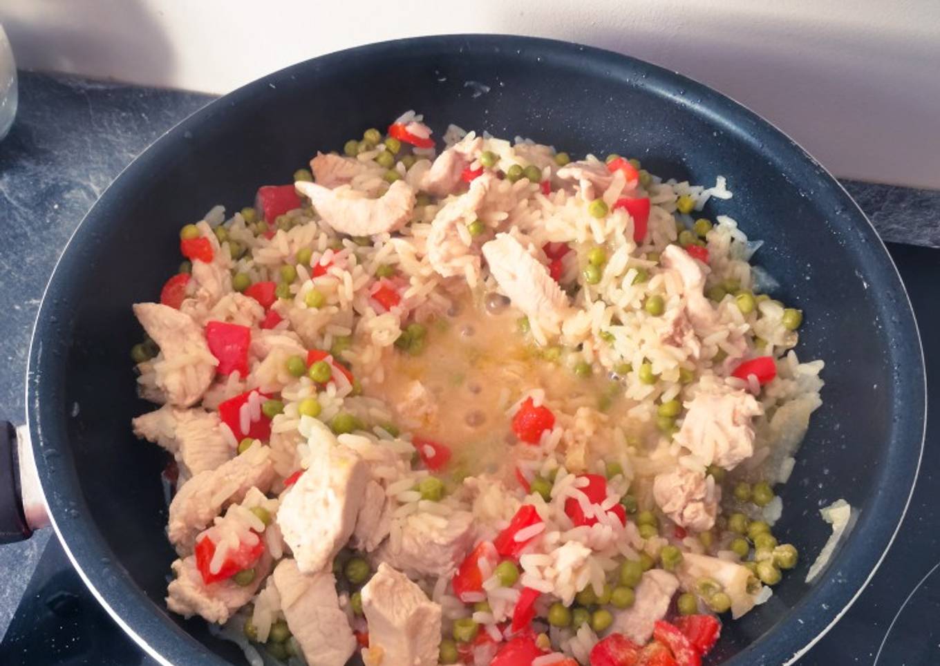 Poêlée poulet, riz et petit pois