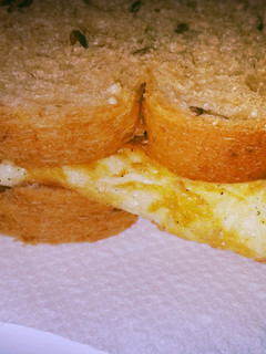 A picture of Square fried egg sandwich.