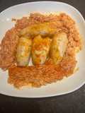 Calamares rellenos con langostinos en salsa fileto