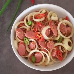 A picture of Sautéed Sliced Chicken Franks with Anchovies.