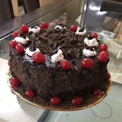 A picture of Black Forest cake in kadaai.