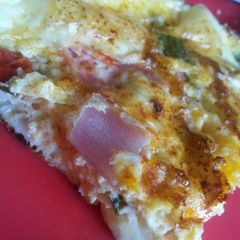 A picture of Salsa and ham Spanish omlette.