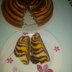 A picture of Zebra cake and rainbow swirl cake.