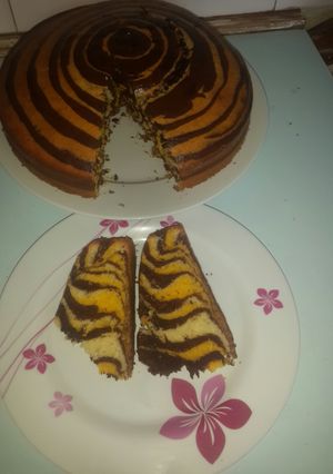 A picture of Zebra cake and rainbow swirl cake.
