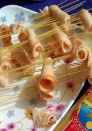 A picture of fun spaghetti and ham.