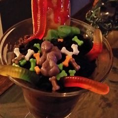 A picture of Zombies & worms in dirt.