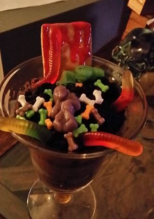 A picture of Zombies & worms in dirt.