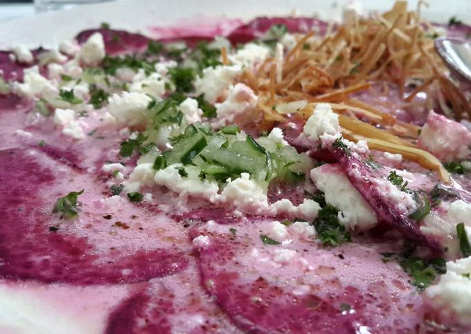 Beetroot carpaccio with goat cheese