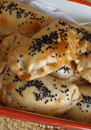 Una foto de Empanadas de ricotta, espinacas y pak-choi