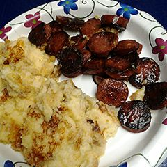 A picture of Sausage and mashed potatoes.