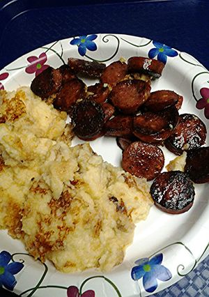 A picture of Sausage and mashed potatoes.