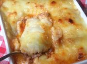 A picture of baked mashed potato ground meat