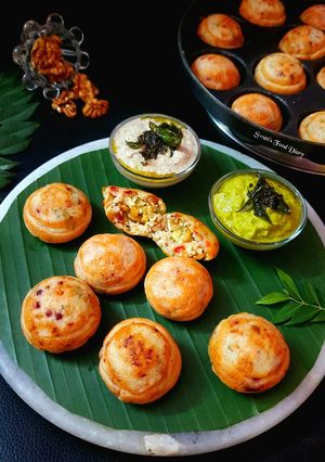 A picture of Walnut, Paneer and Cheese stuffed Paddu.