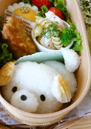 A picture of Bento with Tail-Wagging Puppy.