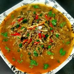 A picture of Spicy Sardine fish curry.