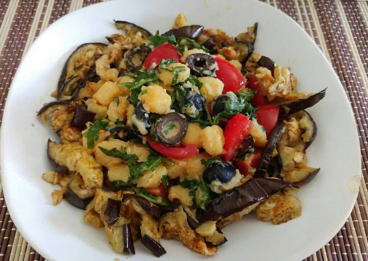 Step-by-Step Guide to Prepare Any-night-of-the-week Gnocchetti con melanzane al forno, pomodori olive e rucola