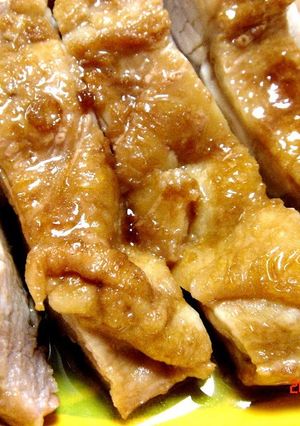A picture of Chicken Cooked in Garlic, Butter, and Soy Sauce.
