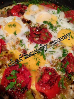 A picture of Eggs with Fried Tomatoes.
