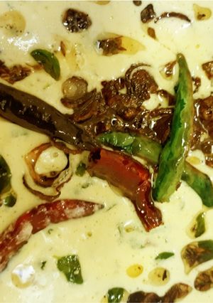 A picture of Moringa leaves in Yogurt gravy.