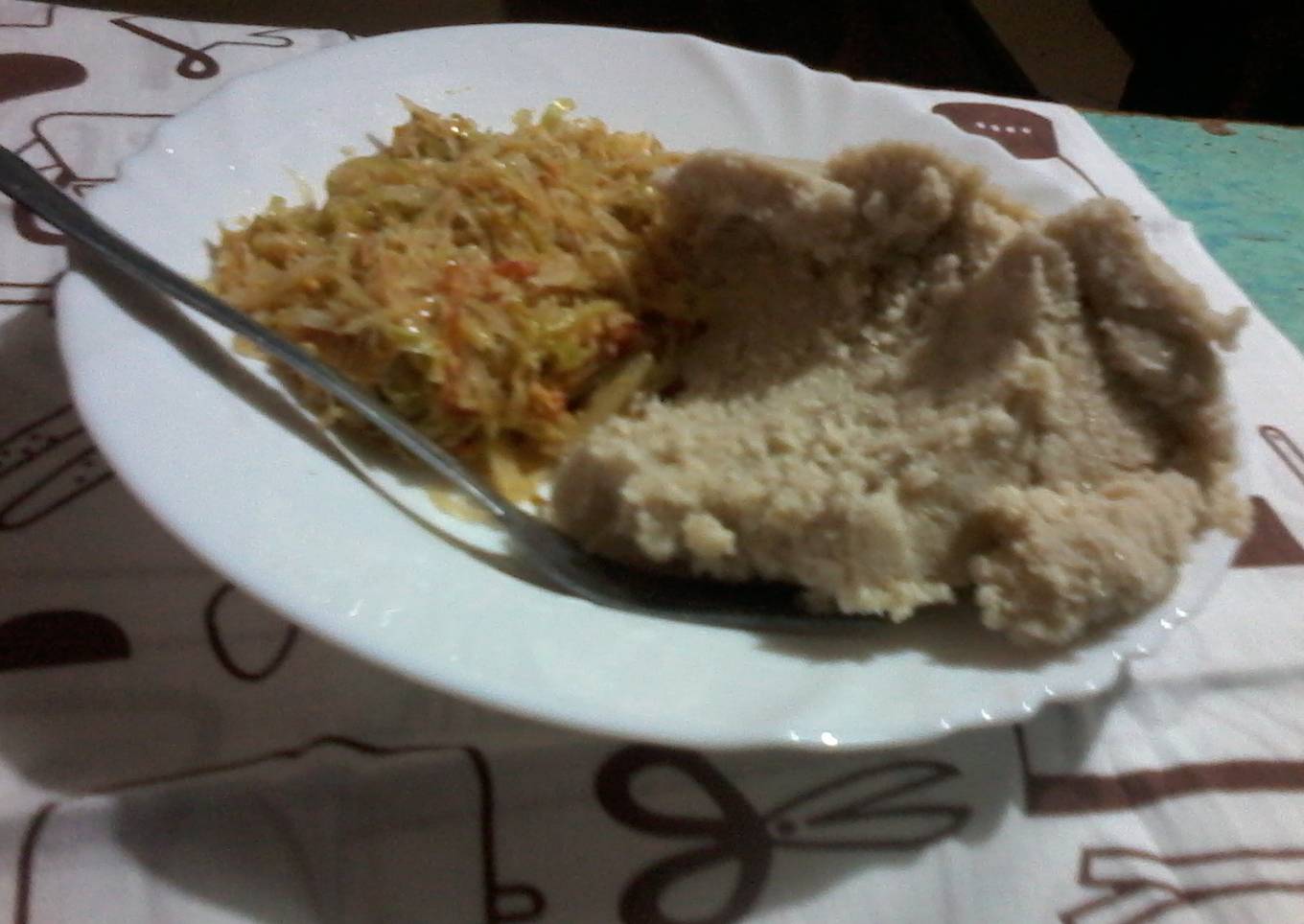 A mixture of cabbage and eggs with ugali