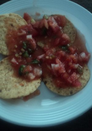 A picture of Tortilla Chips or Nachos with Drunken Salsa, Martín Style. Mexico.