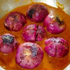 A picture of Dhaba Style Stuffed Onion Curry Recipe - Indian Spicy Cooking.