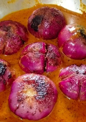 A picture of Dhaba Style Stuffed Onion Curry Recipe - Indian Spicy Cooking.