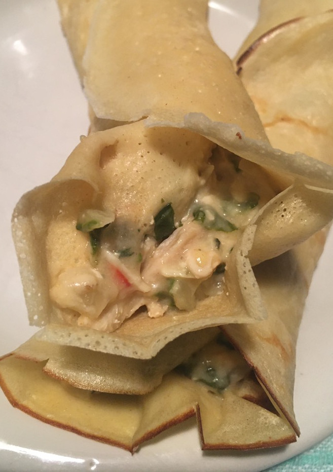 Una foto de Panqueques rellenos con acelga y pollo