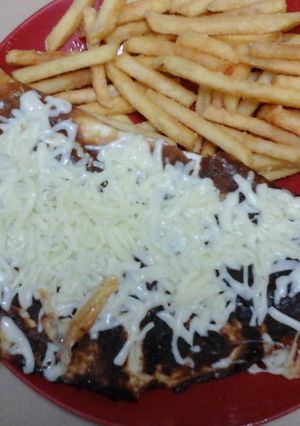A picture of My Folded Omelette with Bacon, Onion and Cheese Inside, Topped with Grated Mozzarella 😘.