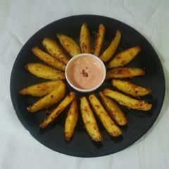 A picture of Potato wedges.
