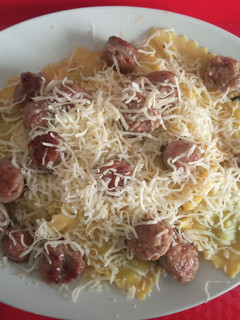 Una foto de Sellos de pasta fresca rellenos de ricota y espinacas