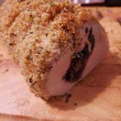 A picture of Stuffed pork tenderloin with Parmesan crust.